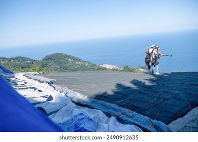 Paraglider Parachute Take Off Cliff - Powered by Shutterstock