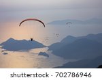 Paragliding in the sky aerial view   ( Canon EOS 5D Mark IV + Canon EF 70-200MM F2.8L IS II USM Lens )