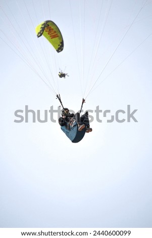 Similar – Suspended-X Paragliding