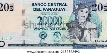 Paraguayan woman on right, holding pitcher. Portrait from Paraguay 20000 Guaranies 2007 Banknotes.