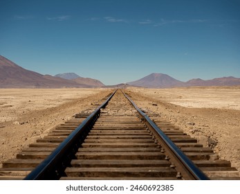 Parallel rail tracks in the Chiguana salt flats, Bolivian highlands, South America. Mirage effect on the horizon. - Powered by Shutterstock