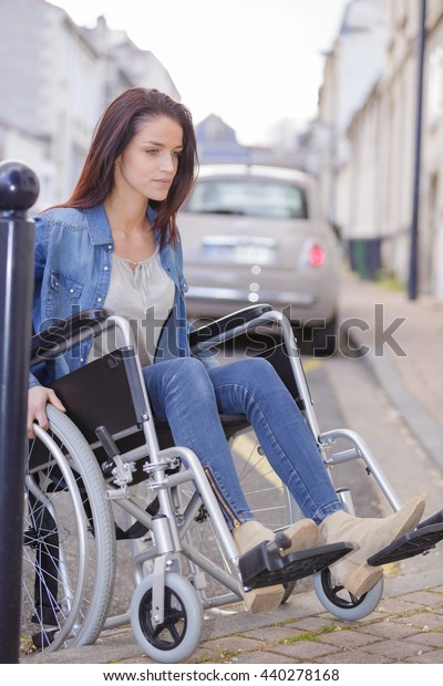 Paralyzed Woman Using His Wheelchair Stock Photo (Edit Now) 440278168