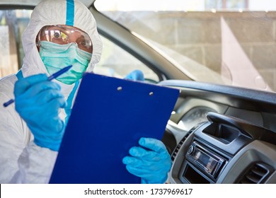 Paramedic As Containment Scout Leads Contact Tracking List In Ambulance At Coronavirus Pandemic