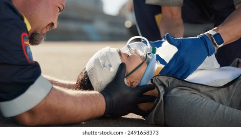 Paramedic, emergency and injury on road with concussion check from accident with help, EMT man and first aid. Patient, ambulance and medical people with rescue on stretcher for transport to clinic