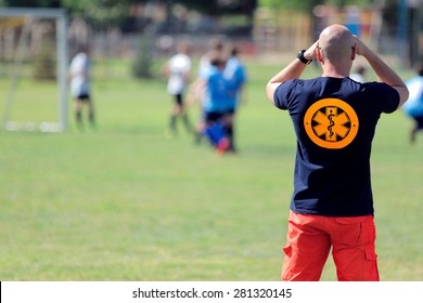 Paramedic for a football game of young boys