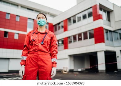 Paramedic in front of isolation hospital facility.Coronavirus Covid-19 heroes.Mental strength of medical professional.Emergency room doctor prepared for virus outbreak.Ready for hard work.Brave nurse
