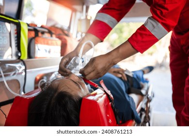 Paramedic is helping wear cervical neck collars the patient who is stop breathing and heart attack and street accident .Rescue team concept - Powered by Shutterstock