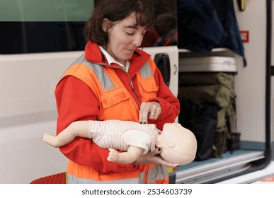 Paramedic practicing CPR on an infant mannequin during an emergency training session near an ambulance. - Powered by Shutterstock