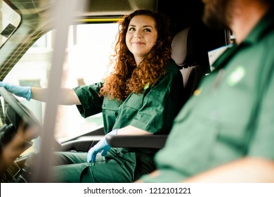 Paramedic Woman Driving An Ambulance