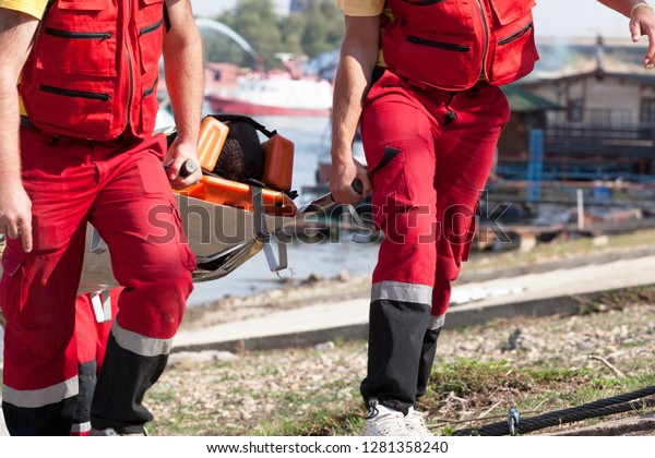 Paramedics in a
rescue operation after
drowning
