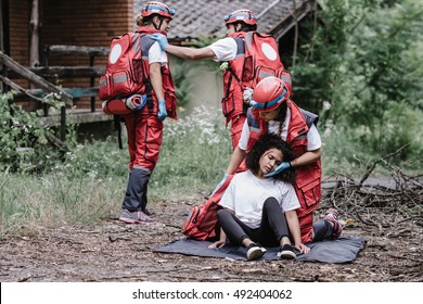 Paramedics Rescuing Disaster Victim