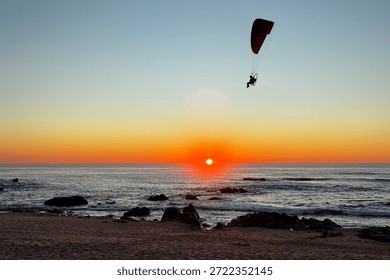 Paramotor Flight Over Ocean Sunset