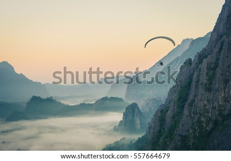 The para-motor fly over silver peak in Laos