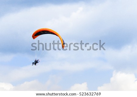 Paramotor flying in the sky