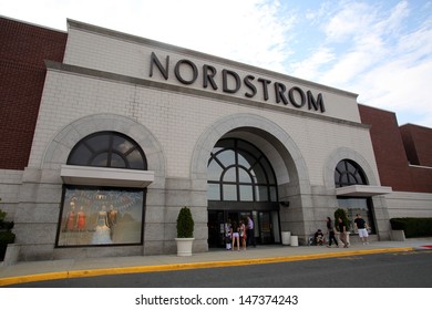 PARAMUS - JULY 9: Shoppers walk past a Nordstrom department store in Paramus, New Jersey, on Tuesday, July 9, 2013. Nordstrom is a major clothing retailer.
