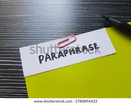 Paraphrase writting on table background. 