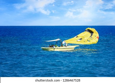 Parasailing In Aegean Sea In City Of Rhodes (Rhodes, Greece)