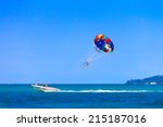 Parasailing is a popular pastime in many resorts around the world. The active form of relaxation. Focus on a parachute.