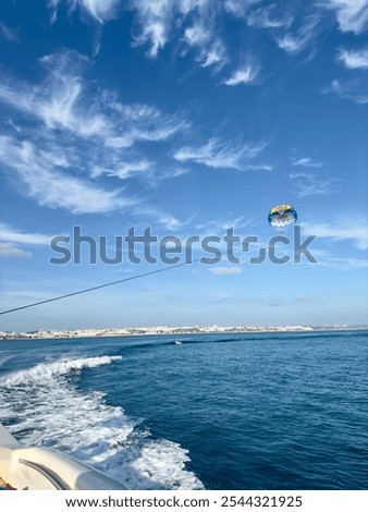 Parasailing in the Summer Sky