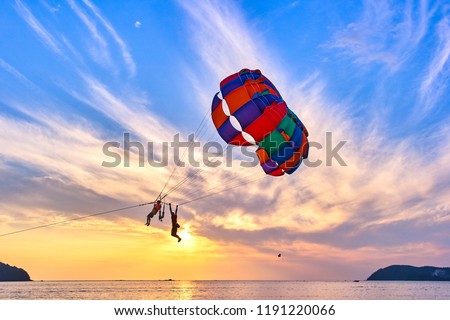 Parasailing at sunset