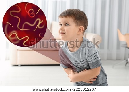 Parasites under microscope and boy suffering from helminthiasis