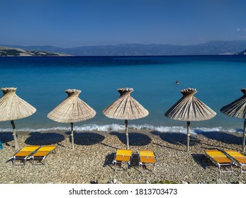 Parasols On Main Beach In Baska, Island Krk, Croatia