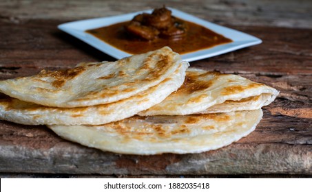 Paratha,Parata, Parotha With Sri Lankan Style Spicy Prawns Curry