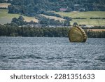 Paratroopers landing on a drop zone. Jumps into the water.