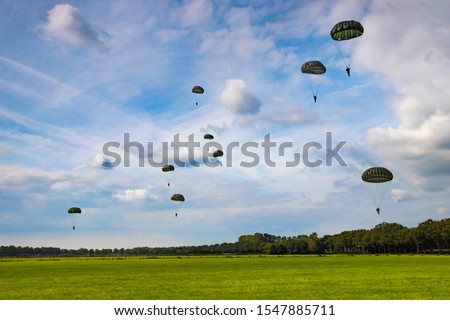 Paratroopers reenacting a jump from a World War 2 (ww2) transport plane during operation Market Garden in Holland / The Netherlands. During the 75 year commemoration at 17th September 2019, Schijndel.