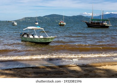 Paraty, Rio De Janeiro, Brazil, January 07, 2014. Fishing Boat Moored At Cabore Beach In The Municipality Of Paraty, South Coast Of The State Of Rio De Janeiro, Brazil