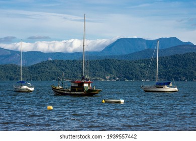 Paraty, Rio De Janeiro, Brazil, January 07, 2014. Fishing Boat Moored At Cabore Beach In The Municipality Of Paraty, South Coast Of The State Of Rio De Janeiro, Brazil