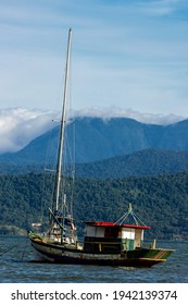 Paraty, Rio De Janeiro, Brazil, January 07, 2014. Fishing Boat Moored At Cabore Beach In The Municipality Of Paraty, South Coast Of The State Of Rio De Janeiro, Brazil