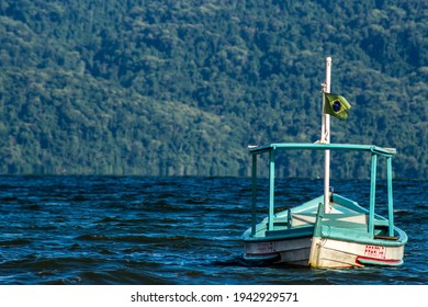 Paraty, Rio De Janeiro, Brazil, January 07, 2014. Fishing Boat Moored At Cabore Beach In The Municipality Of Paraty, South Coast Of The State Of Rio De Janeiro, Brazil