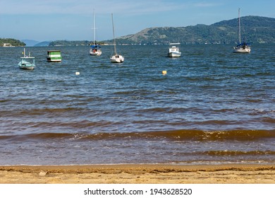 Paraty, Rio De Janeiro, Brazil, January 07, 2014. Fishing Boat Moored At Cabore Beach In The Municipality Of Paraty, South Coast Of The State Of Rio De Janeiro, Brazil