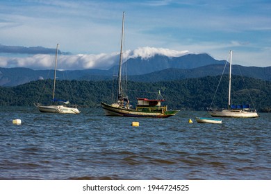 Paraty, Rio De Janeiro, Brazil, January 07, 2014. Fishing Boat Moored At Cabore Beach In The Municipality Of Paraty, South Coast Of The State Of Rio De Janeiro, Brazil