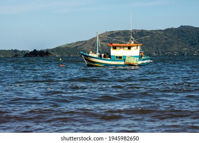 Paraty, Rio De Janeiro, Brazil, January 07, 2014. Fishing Boat Moored At Cabore Beach In The Municipality Of Paraty, South Coast Of The State Of Rio De Janeiro, Brazil