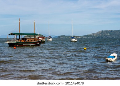 Paraty, Rio De Janeiro, Brazil, January 07, 2014. Fishing Boat Moored At Cabore Beach In The Municipality Of Paraty, South Coast Of The State Of Rio De Janeiro, Brazil