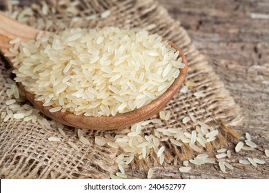 Parboiled Rice On Wooden Surface