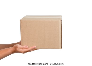 A Parcel Cardboard Parcel Box In A Delivery Woman Person Hands Isolated On White Background. Delivery Service Concept. Asian Young Girl Holding A Package Is A Delivery Business Entrepreneur.