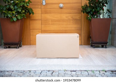 Parcel On Door Mat Near Entrance