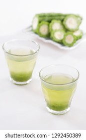 Pare or Bitter melon juice on the glass - Shutterstock ID 1292450389