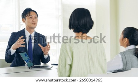 Parent and child having a three-way interview