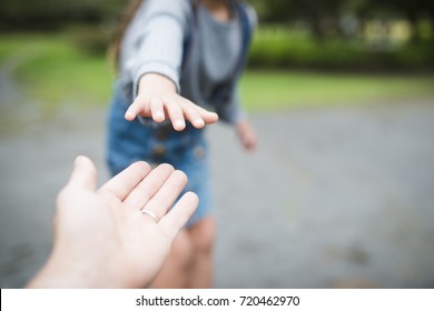 Parent And Child Playing In The Park