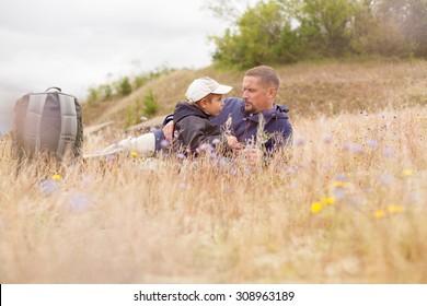 Parent Talking Child Nature Lying Grass  Meadow Field Shallow DOF