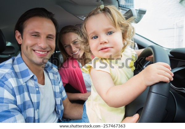 Parents and baby on a
drive in their car