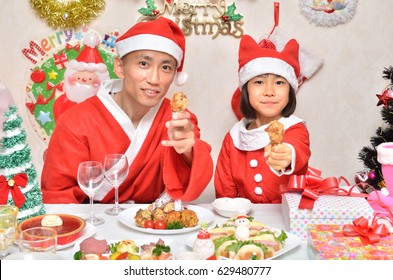 Parents And Children Enjoy The Christmas Party