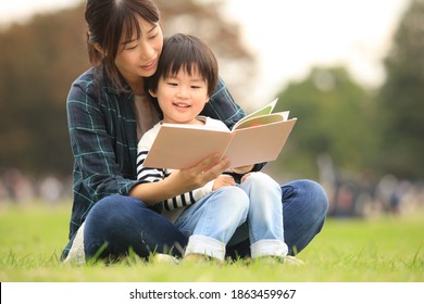 Parents And Children Reading Books