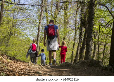 Parents with children walking by hiking trail
 - Powered by Shutterstock