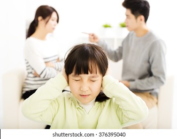 Parents Fighting And Little Girl Being Upset