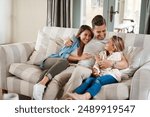 Parents, girl and happy on sofa with hug, conversation or funny story for bonding, care and love in lounge. Father, mother and daughter with embrace, laugh and memory with connection in family home